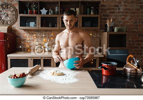 Man In Underwear Cooking Dessert On The Kitchen Male Person Preparing