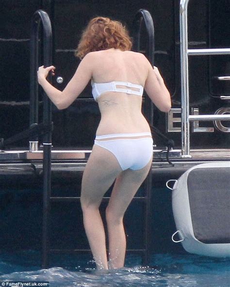 Lily Cole Almost Reveals Too Much After Losing Her Bikini Top While