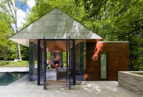 Pavilion Style House With Glass Walls And Organic Interiors