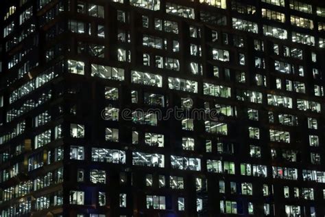 Modern Office Building Glass Wall Side View At Night Close Up Stock