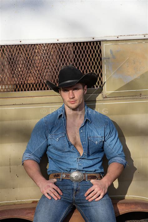 Cowboy Leaning Against A Trailer On A Ranch Rob Lang Images