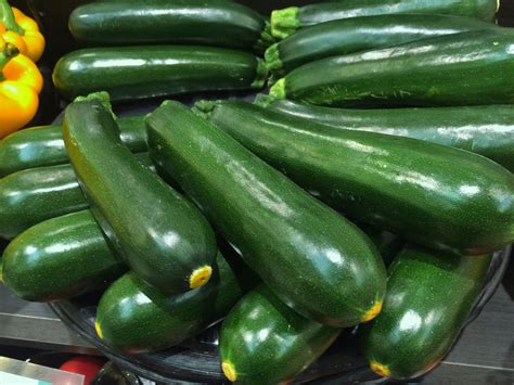 Crosshatching and salting the zucchini for 10 minutes before cooking removes excess moisture and lets the seasoning penetrate all the way through. Zucchini Fertility Spawns Annual Holiday | The Old Farmer ...