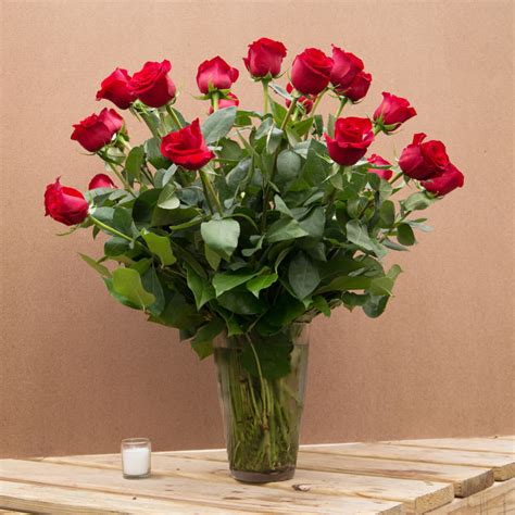 Multiple Dozens Long Stem Red Roses Arranged In Peabody Ma Evans Flowers