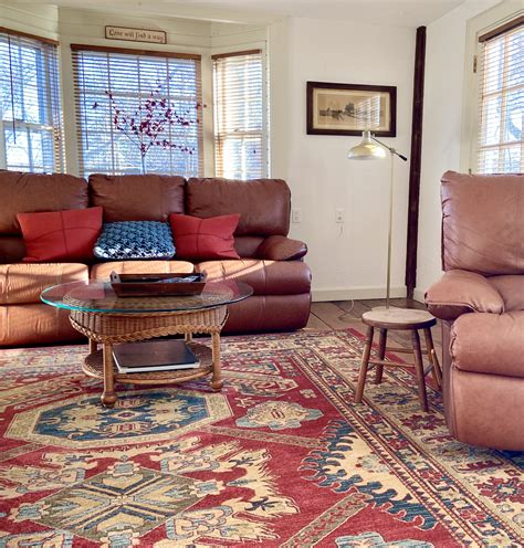 Everything built in the u.s.a. Red Persian Rug in 2020 | Brown leather couch, Red persian ...