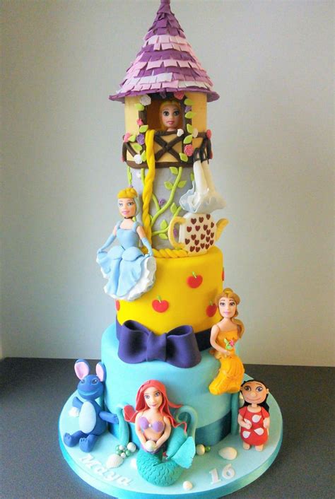 Disney princess this is a five tiers cake with all her favorite princesses!! Disney themed cake, Cinderella, Tangled, Ariel, Alice ...