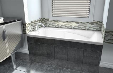 Ceramic tiles are a great way to go. alcove tub with tile front - faucet will be mounted on the ...