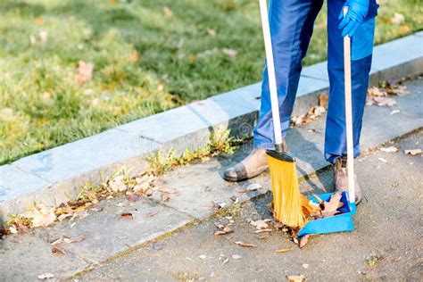 Sweeping Leaves With Broom And Scoop Stock Photo Image Of Legs