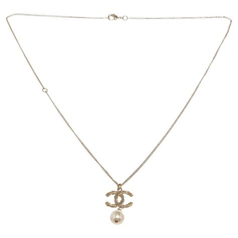 Chanel Cc Dangle Pearl Pendant Gold Tone Necklace For Sale At 1stdibs