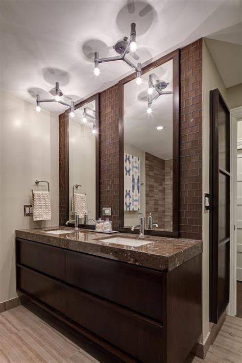 Modern Bathroom Features Stunning Futuristic Lighting And Double Vanity