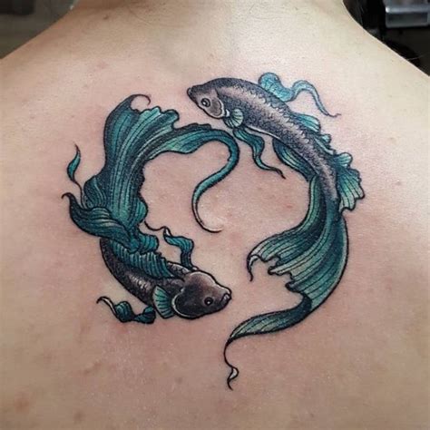 16 Meaningful Tattoos For Pisces Pisces Tattoo Designs Pisces
