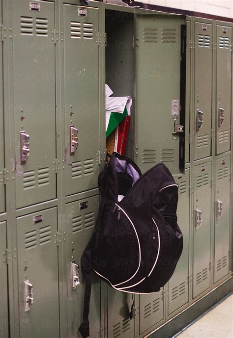Backpack Hangs From Open Messy Locker In School Hallway By Tana Teel High School Locker