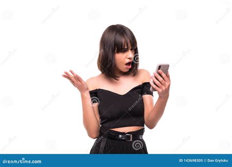 Annoyed Angry Young Woman Mad About Spam Message Stuck Phone Looking At Smartphone Isolated On