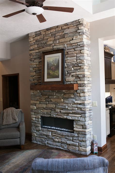 Custom stacked stone fireplace