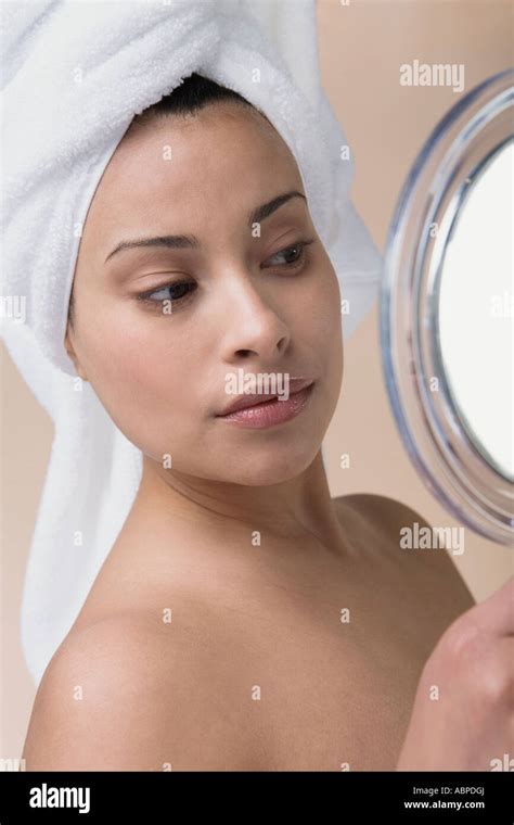 Woman Admiring Herself In Mirror Stock Photo Alamy