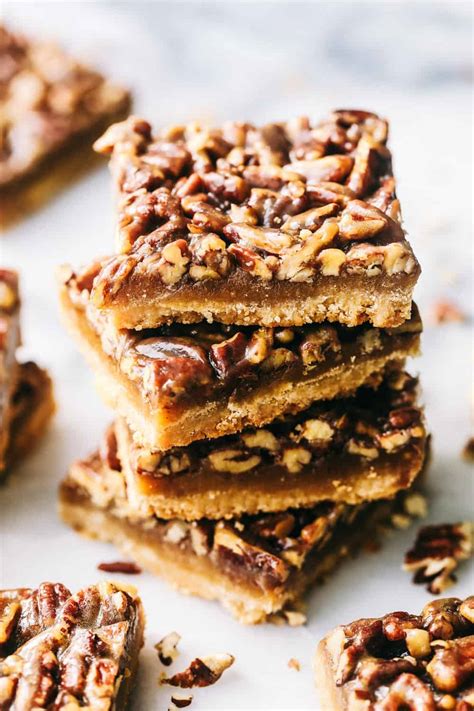 Classic pecan pie goes portable with this chocolate bar cookie recipe perfect for dessert or sweet midday snack. Best Ever Pecan Pie Bars | The Recipe Critic