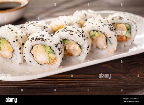 Sushi Roll Sushi With Prawn Avocado Cream Cheese And Sesame Sushi