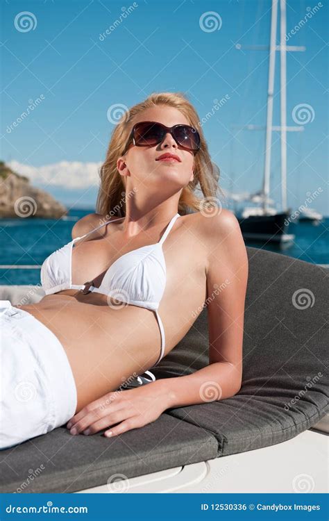 Attractive Bikini Woman Sunbathing On Luxury Yacht Stock My Xxx Hot Girl