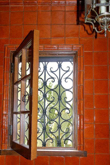 The construction of the rainstorm glass allows for the windows to open for optimal ventilation, especially during the sunnier seasons. powder room window with cactus | Iron windows, Wrought ...