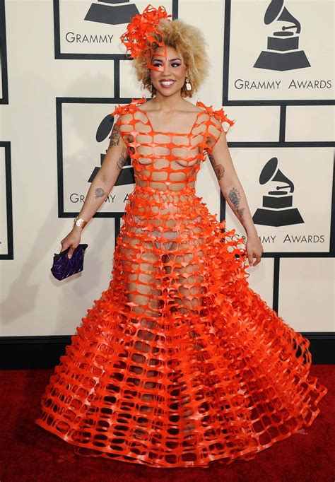 The joy of life combines intriguing but incompatible parts. Joy Villa in a bizarre orange gown at the 2015 Grammy ...