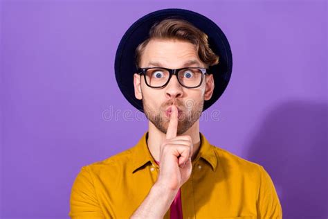 Photo Of Afraid Shocked Young Man Hold Finger Mouth Lips Silence Secret