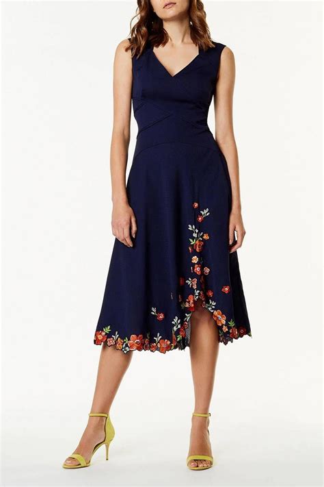 We've been invited to 3 weddings this summer and my dress wardrobe is running on empty. Embroidered hem dress, £250, Karen Millen # ...