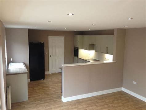 Try opening up the kitchen wall to living room by thetarnishedjewelblog.com. Image Gallery for IHUS Products | Half wall kitchen, Half ...