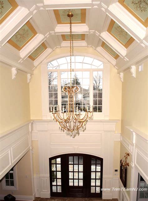 I've found it's faster and more economical to make a pair of arched ledgers and to fasten them to the gable walls, then run joists to span between the ledgers to frame the barrel vault. Coffered Ceilings and Beams | Trim Team NJ - Woodwork ...