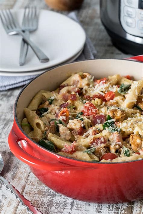 Cook 8 minutes, browning on all sides. Pressure Cooker Chicken Bacon Penne Pasta in a Garlic ...