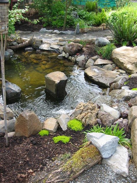 Pond With Boulders And Landscaping Salem The Garden Angels