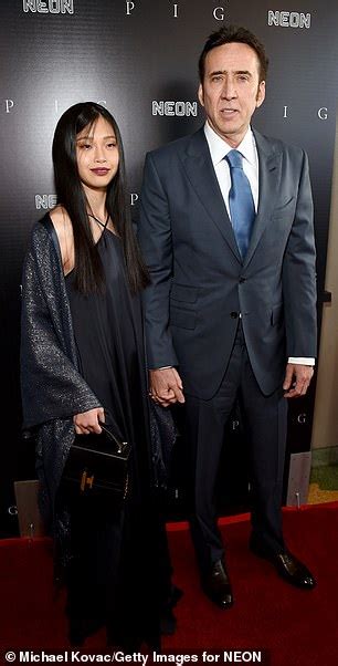 Nicolas Cage And Wife Riko Shibata At The La Premiere Of Pig