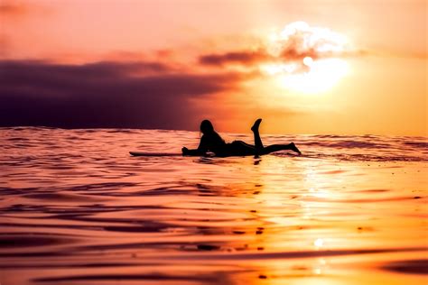 1280x768 Resolution Silhouette Of Woman Lying Down On Paddle Board