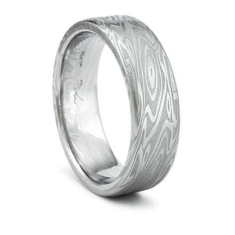 Damascus Ring Unique Mens Wedding Band Twisted Wood Grain Pattern On A