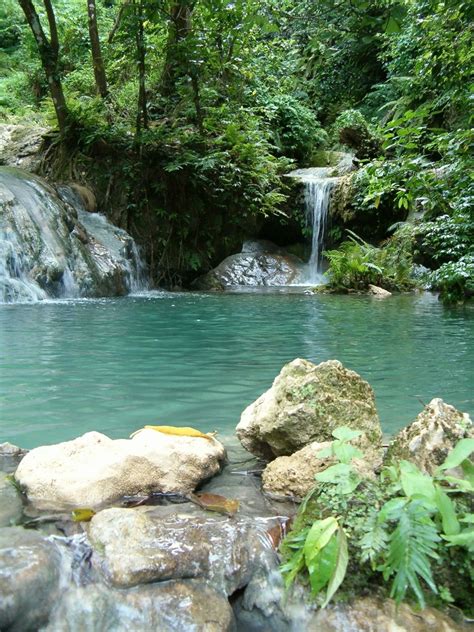 Fiberglass swimming pool water features: Free waterfall rock pool Stock Photo - FreeImages.com