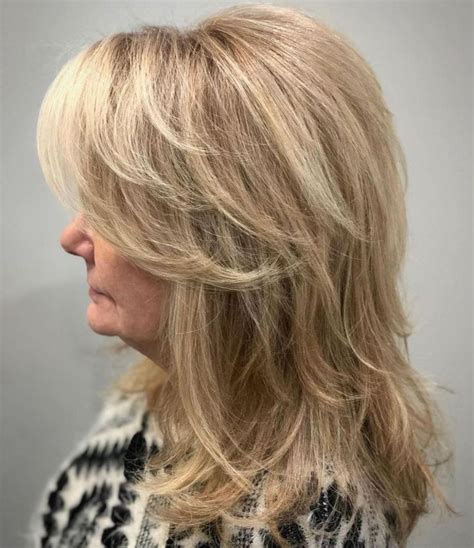 Medium Feathered Haircut For Women Over 50 In 2020 Hair Styles Modern Hairstyles Womens Haircuts