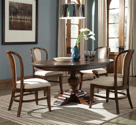 With its signature glow and beautiful coloring, solid cherry wood is a staple hardwood used in kitchens and dining rooms across america. Lawrenceville Wood Round Dining Table and Chairs in New ...