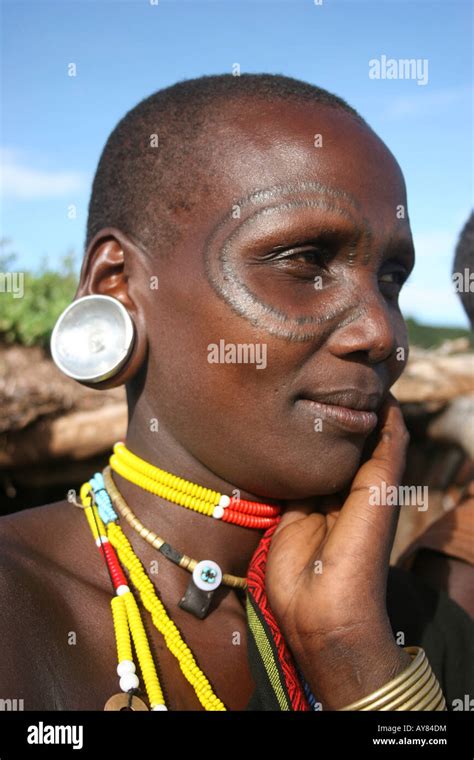 Africa Tanzania Members Of The Datoga Tribe Woman In Traditional Dress Beads And Earrings Beauty