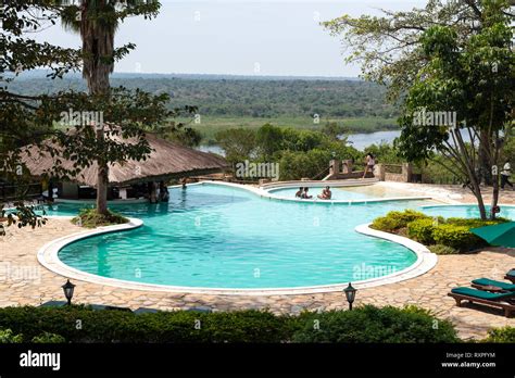 Swimming Pool At Paraa Safari Lodge Next To Victoria Nile River In