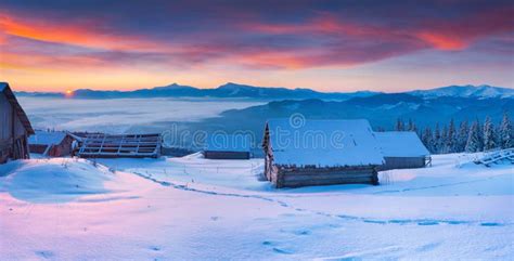 Colorful Winter Panorama Of Carpathian Mountains At Sunrise Stock Photo