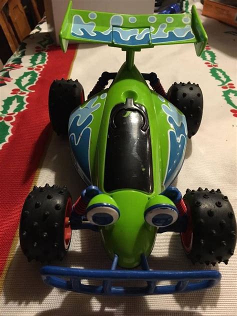 Place them at the starting gate and flip it down to rev 'em up. Toy Story RC Racer Car Disney Pixar Thinkway Toys NON ...