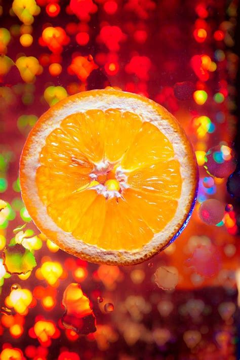 Orange With Many Water Drops On The Abstract Background Stock Photo