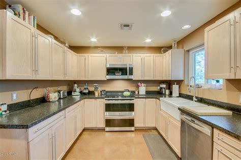 Birch is generally light in color, although it can be stained darker if you'd like (as mentioned above). Light birch cabinets, dark countertop - paint color help ...