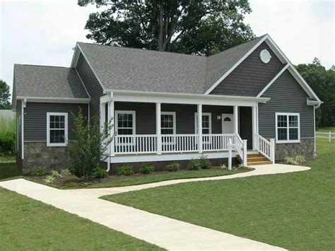 As american has apple pie, these classic ranch house plans embody the spirit of simple construction, easy access and harmony with their surroundings. Image result for a ranch house with charcoal siding ...
