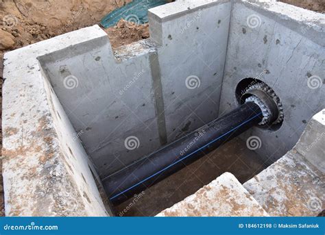 Laying Of Underground Storm Sewer Pipes In Concrete Chamber Installation Of Water Main At The