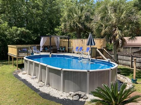 Above Ground Oval Pool And Deck With Privacy Fence Oval Pool Above Ground Pool Landscaping