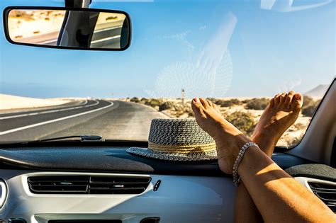 Female Feet On Dashboard During Road License Image 71337349 Image