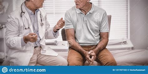 Doctor Interacting With Senior Patient Stock Photo Image Of Attentive