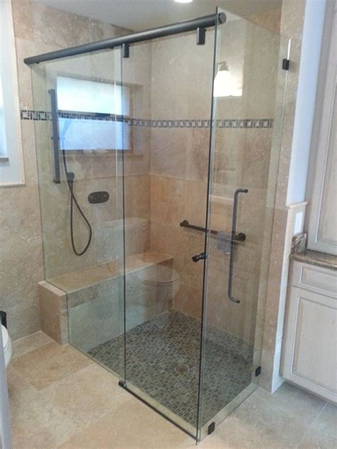 This is different than big box sliders which utilize a clip system that has a very high failure. Sliding shower doors + bench | Shower doors, Sliding ...