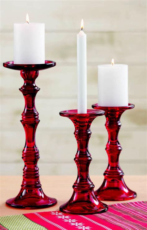 This series of volcanic red mercury metallic crackle glass candle holders have bulbous tops like goblets with slender black glass stems. Red Hurricane Candle Holders | Свечки, Интерьер