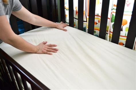 Key crib safety steps like laying your child down on a flat surface, using a firm mattress and having minimal bedding or other objects in the crib are. How to Elevate a Crib Mattress (with Pictures) | eHow