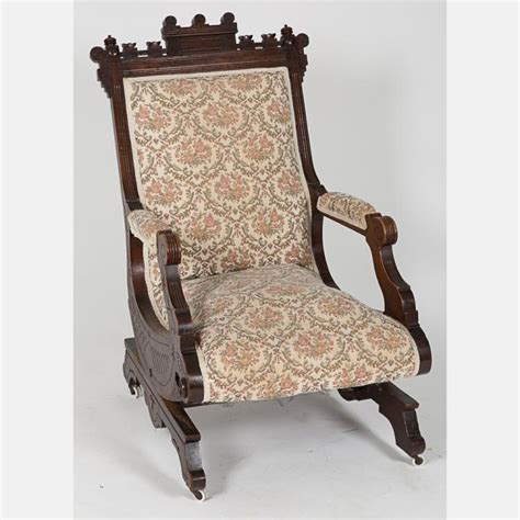 Sold At Auction An Eastlake Style Carved Walnut Rocking Chair 20th